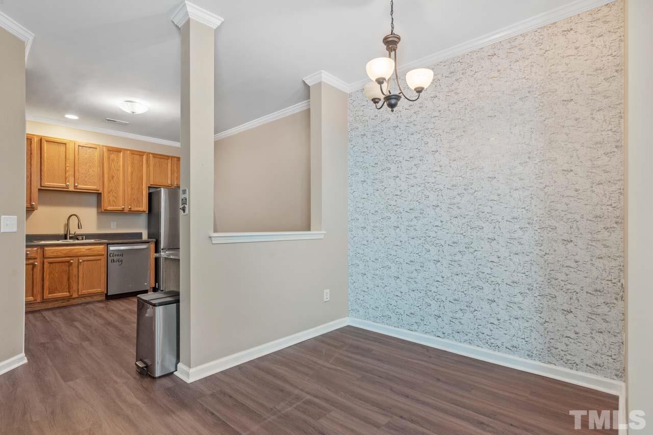 11720 Coppergate Drive, Unit 107 Raleigh, NC 27614 - Photo 8 of 26 a view of kitchen with sink and refrigerator