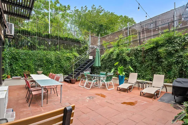 an outdoor space with furniture