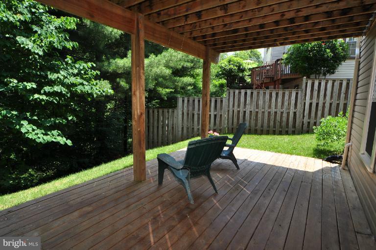 11958 Sentinel Point Court Reston, VA 20191 - Photo 12 of 26 The lower level deck backs to trees.