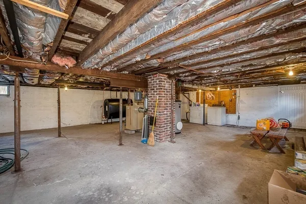 a view of empty room with wooden ceiling