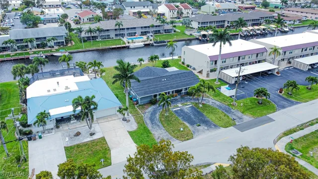an aerial view of a houses and an outdoor space