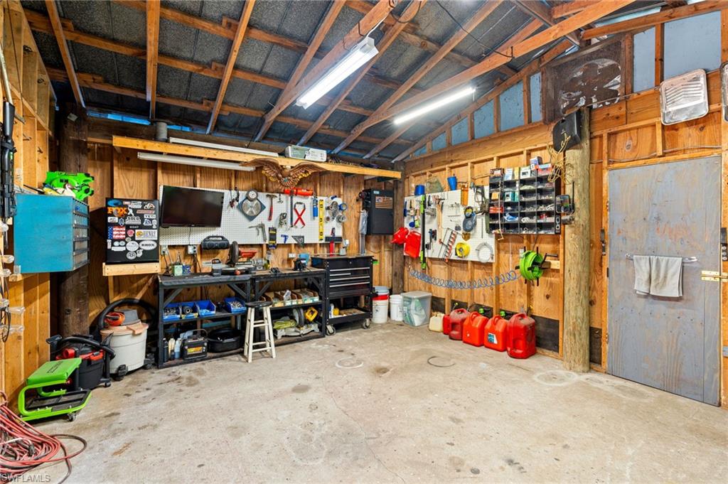 1030 13th Street Southwest Naples, FL 34117 - Photo 29 of 43 a view of storage and utility room