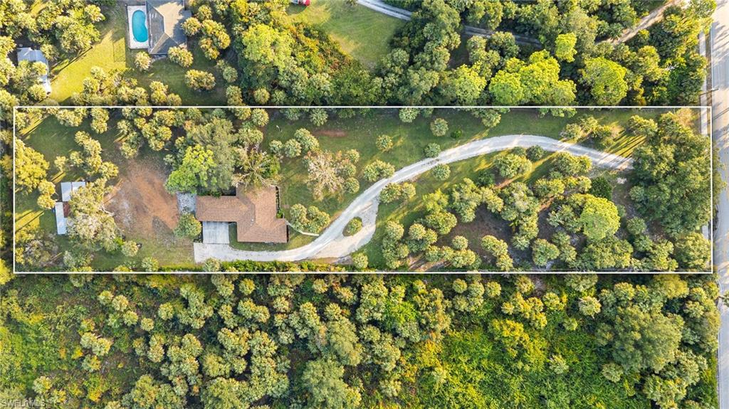 1030 13th Street Southwest Naples, FL 34117 - Photo 34 of 43 a view of outdoor space and garden