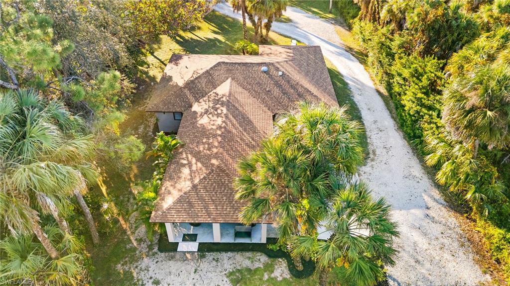 1030 13th Street Southwest Naples, FL 34117 - Photo 38 of 43 a aerial view of a house with a yard