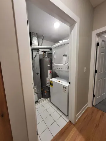 a view of storage and utility room with washer and dryer