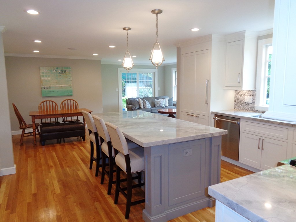 91 Winding River Road Needham, MA 02492 - Photo 11 of 27 a kitchen with sink and chairs