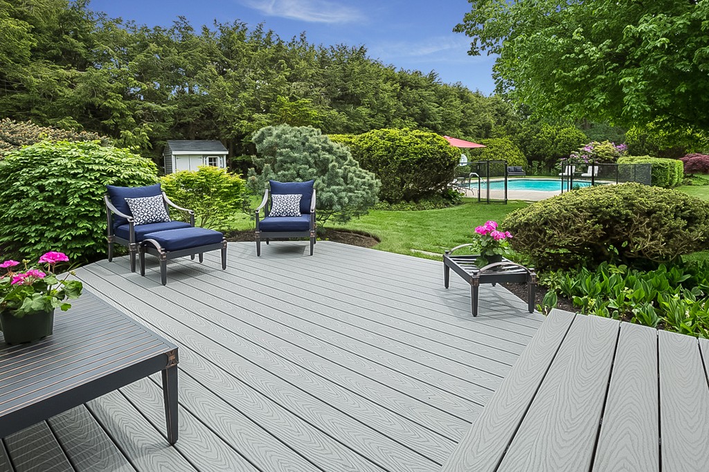 91 Winding River Road Needham, MA 02492 - Photo 23 of 27 a view of a table and chairs in patio of the house