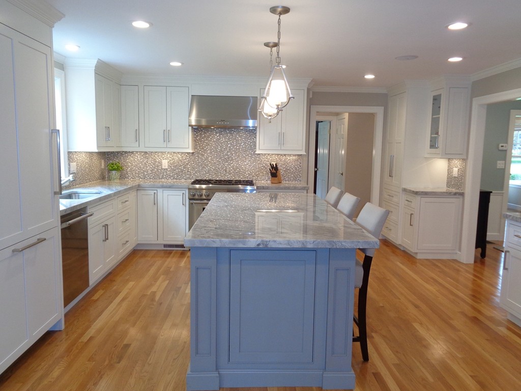 91 Winding River Road Needham, MA 02492 - Photo 10 of 27 a kitchen with stainless steel appliances granite countertop wooden floors sink and cabinets