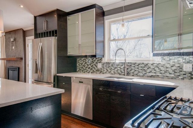 a view of a room with shelves