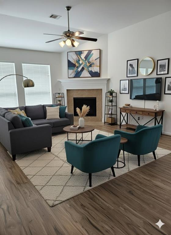5737 Yorkshire Road McKinney, TX 75070 - Photo 3 of 19 a living room with furniture a table and a fireplace