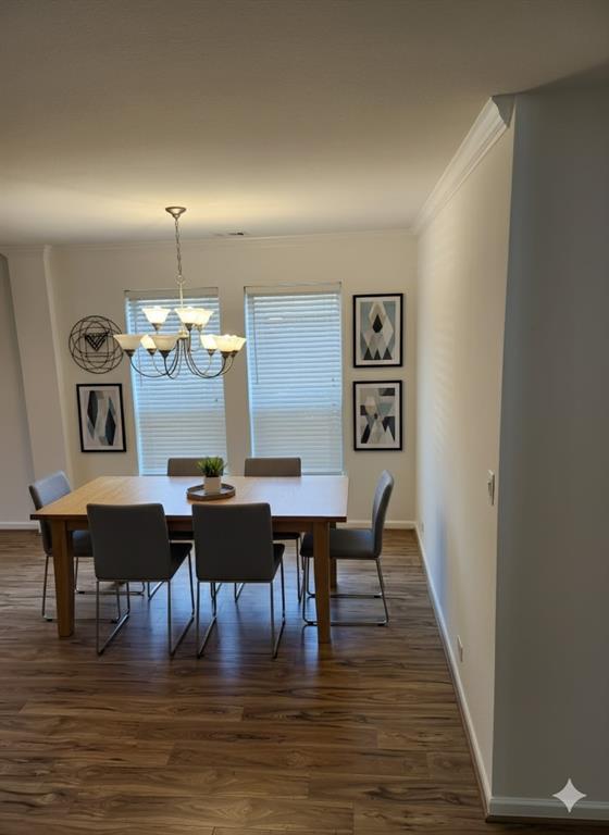 5737 Yorkshire Road McKinney, TX 75070 - Photo 9 of 19 a view of a dining room with furniture wooden floor and chandelier