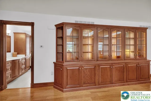 a room with furniture and gym equipment