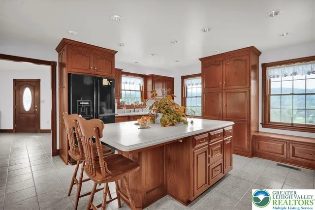 a bathroom with a sink mirror and toilet
