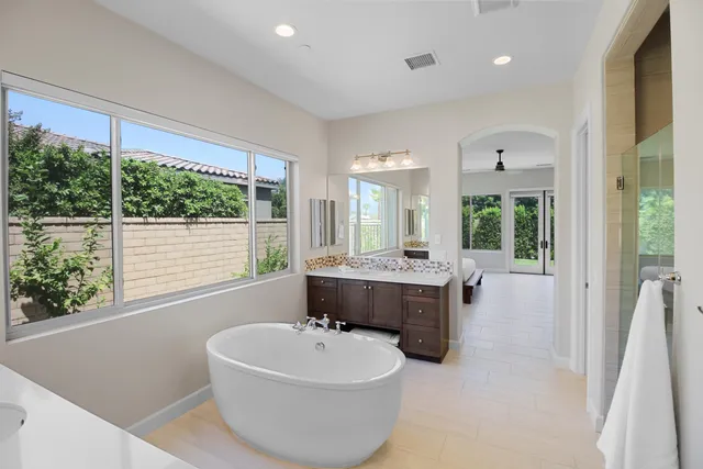 a bathroom with a bathtub and sink