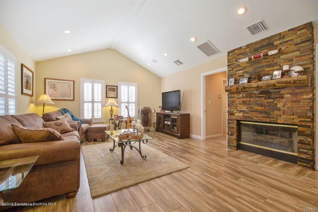 2340 Caldero Lane Montrose, CA 91020 - Photo 4 of 10 a living room with furniture and a fireplace
