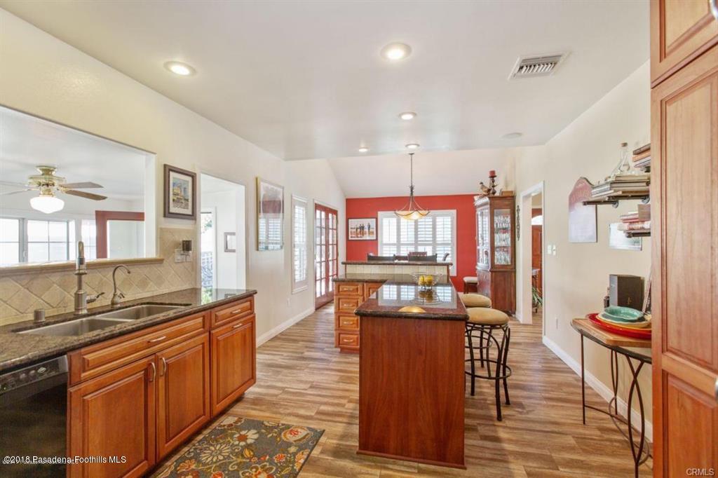 2340 Caldero Lane Montrose, CA 91020 - Photo 5 of 10 a large kitchen with lots of counter space and furniture