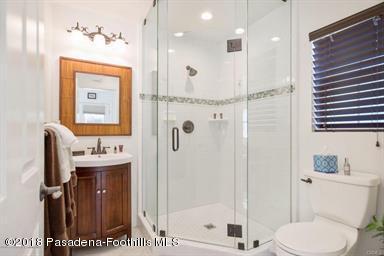 2340 Caldero Lane Montrose, CA 91020 - Photo 7 of 10 a bathroom with a sink a toilet and shower