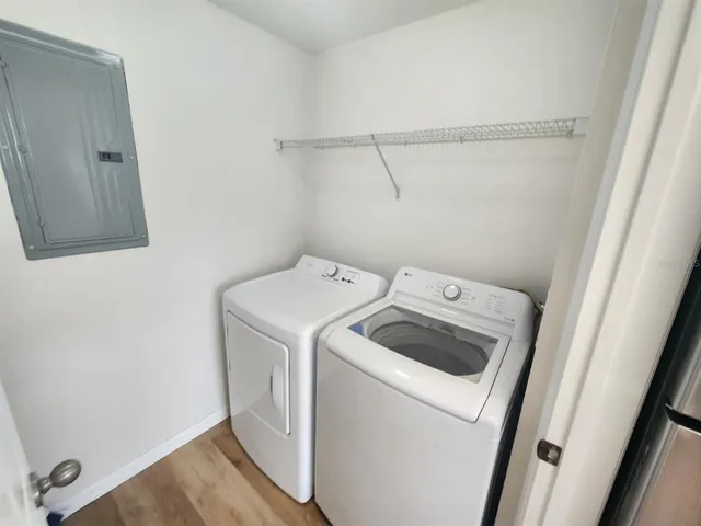 a utility room with dryer and washer