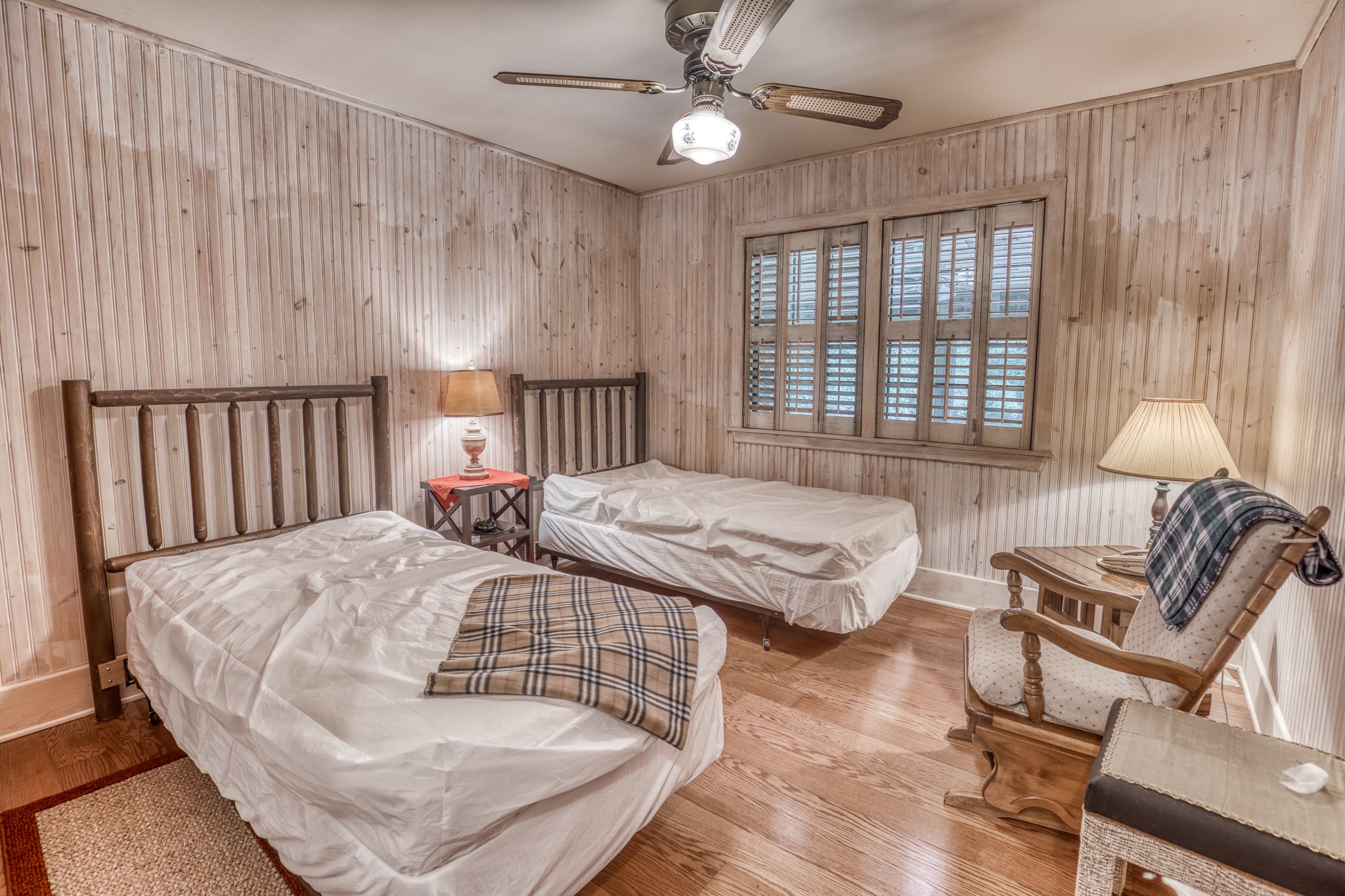 1017 Allen Road Cat Spring, TX 78933 - Photo 36 of 47 a bedroom with a bed and a chandelier