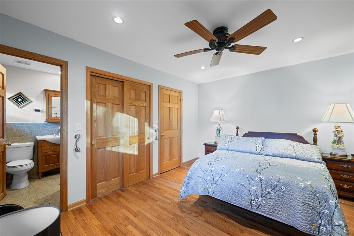 3296 Brook Road Highland Park, IL 60035 - Photo 12 of 21 a bedroom with a bed and a large window