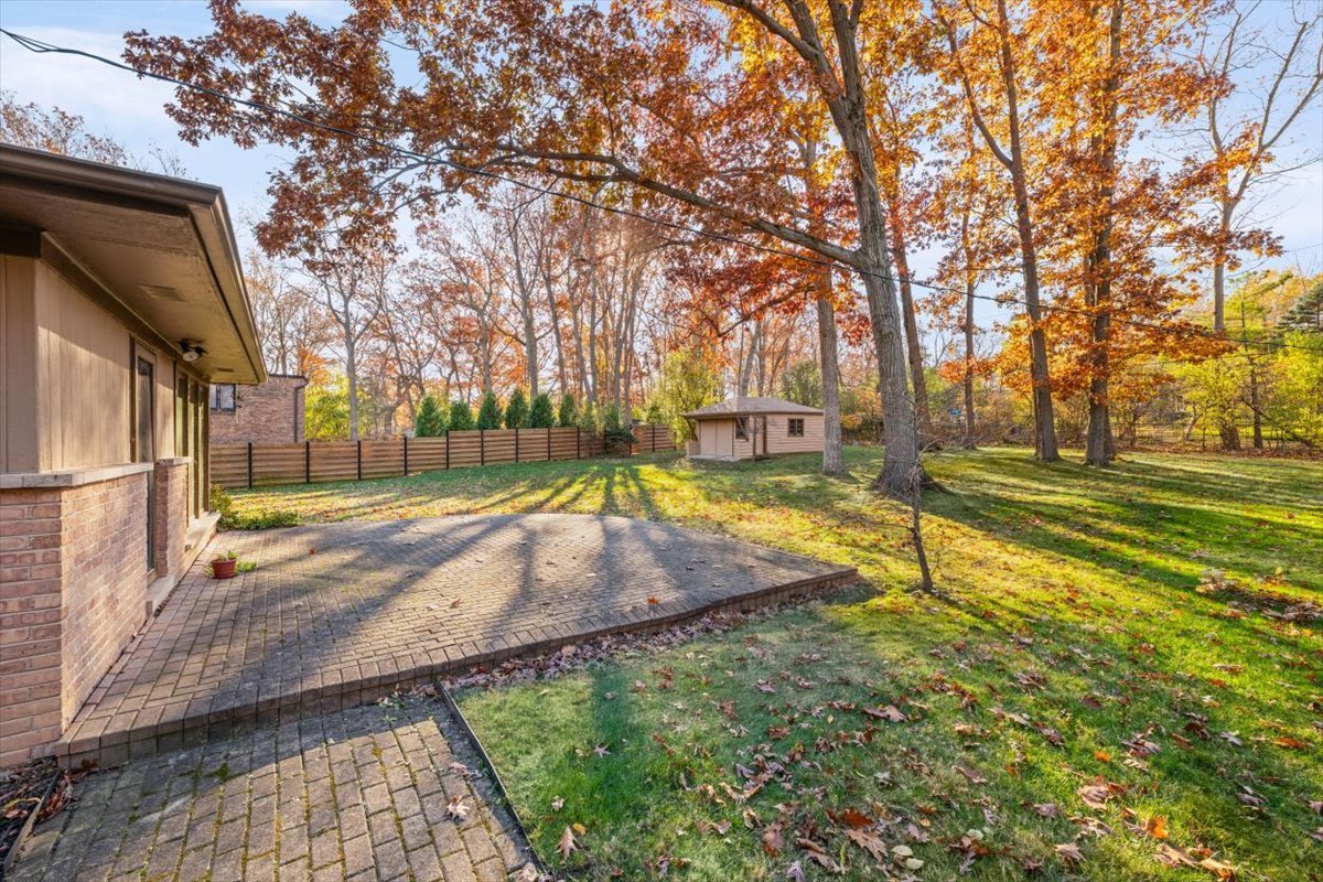3296 Brook Road Highland Park, IL 60035 - Photo 3 of 21 a view of yard with swimming pool and sitting area