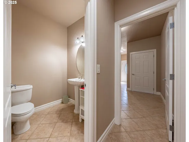 a bathroom with a toilet and a sink