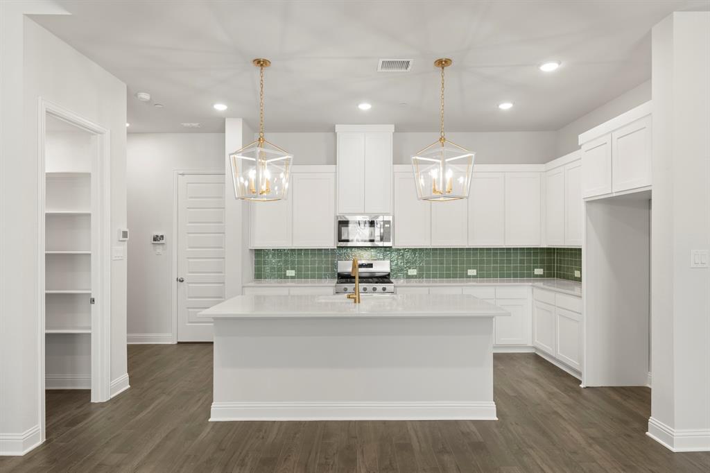 3912 Keya Drive Prosper, TX 75078 - Photo 9 of 32 09. 3912 Keya - Kitchen
