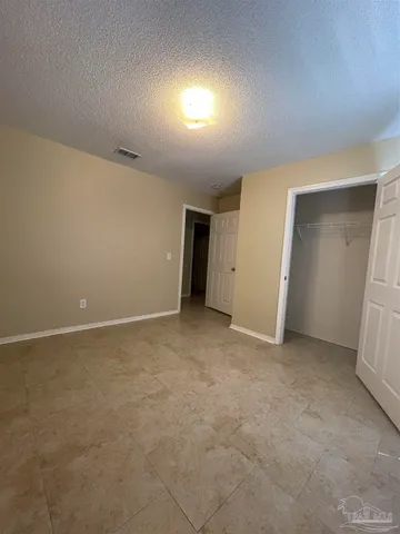 an empty room with an entryway