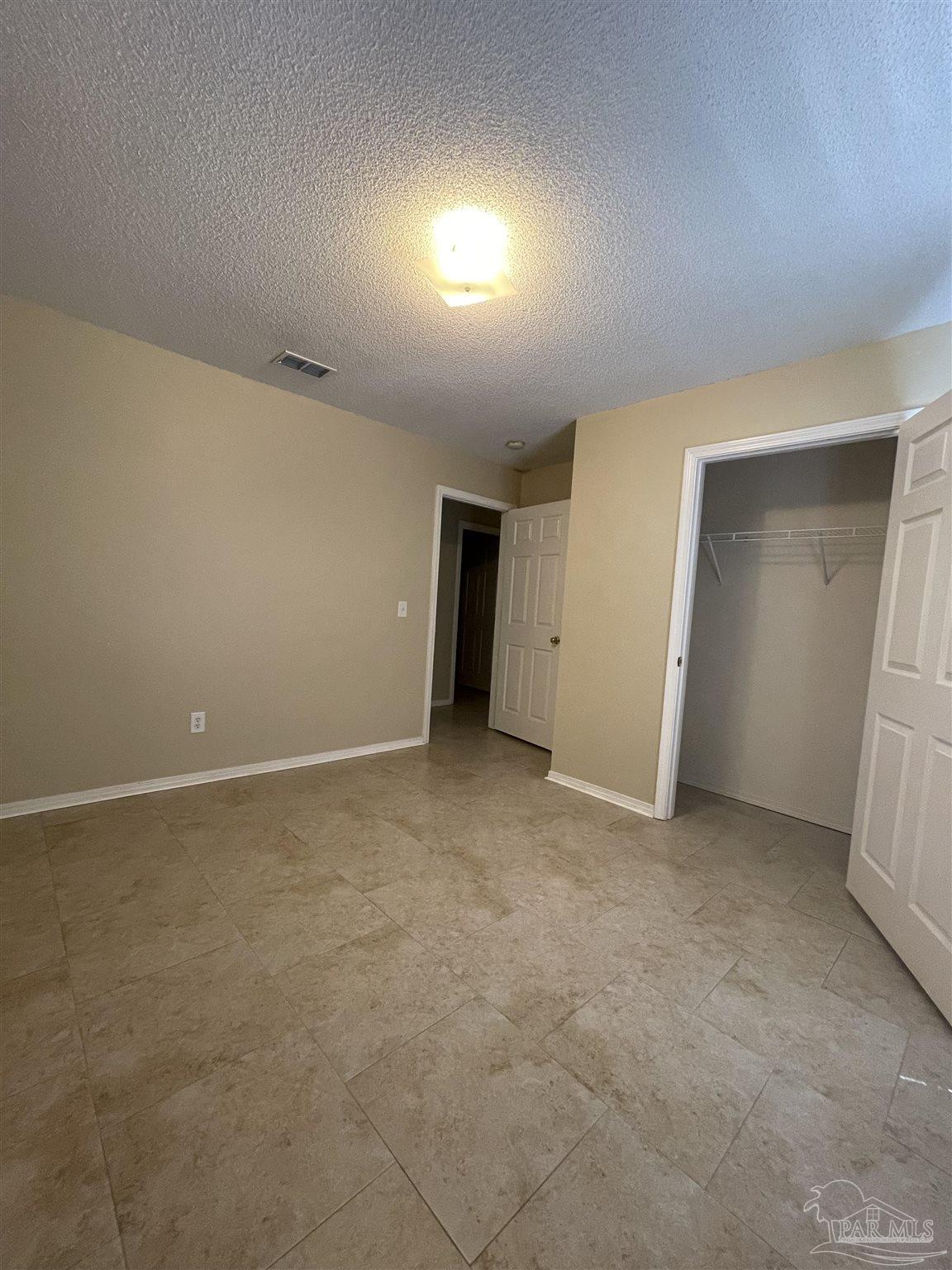6208 St Ann Avenue Milton, FL 32570 - Photo 12 of 20 an empty room with an entryway
