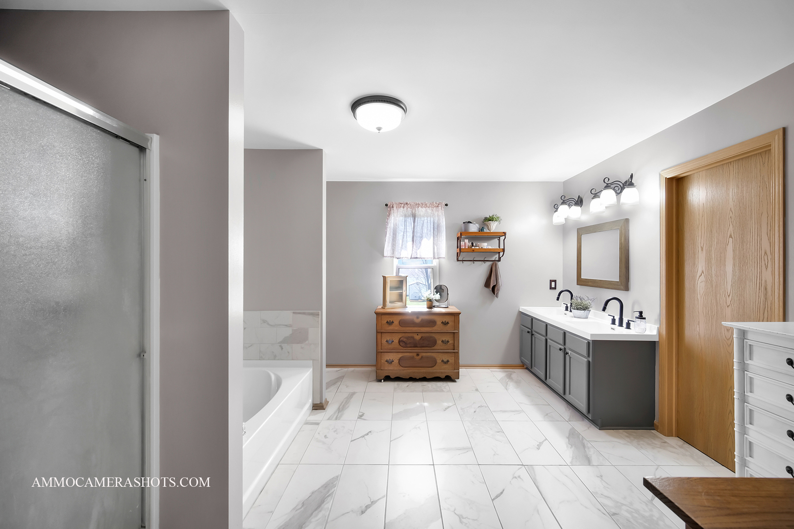 617 Kennedy Street Waterman, IL 60556 - Photo 15 of 32 a large white room with a double vanity sink and a mirror