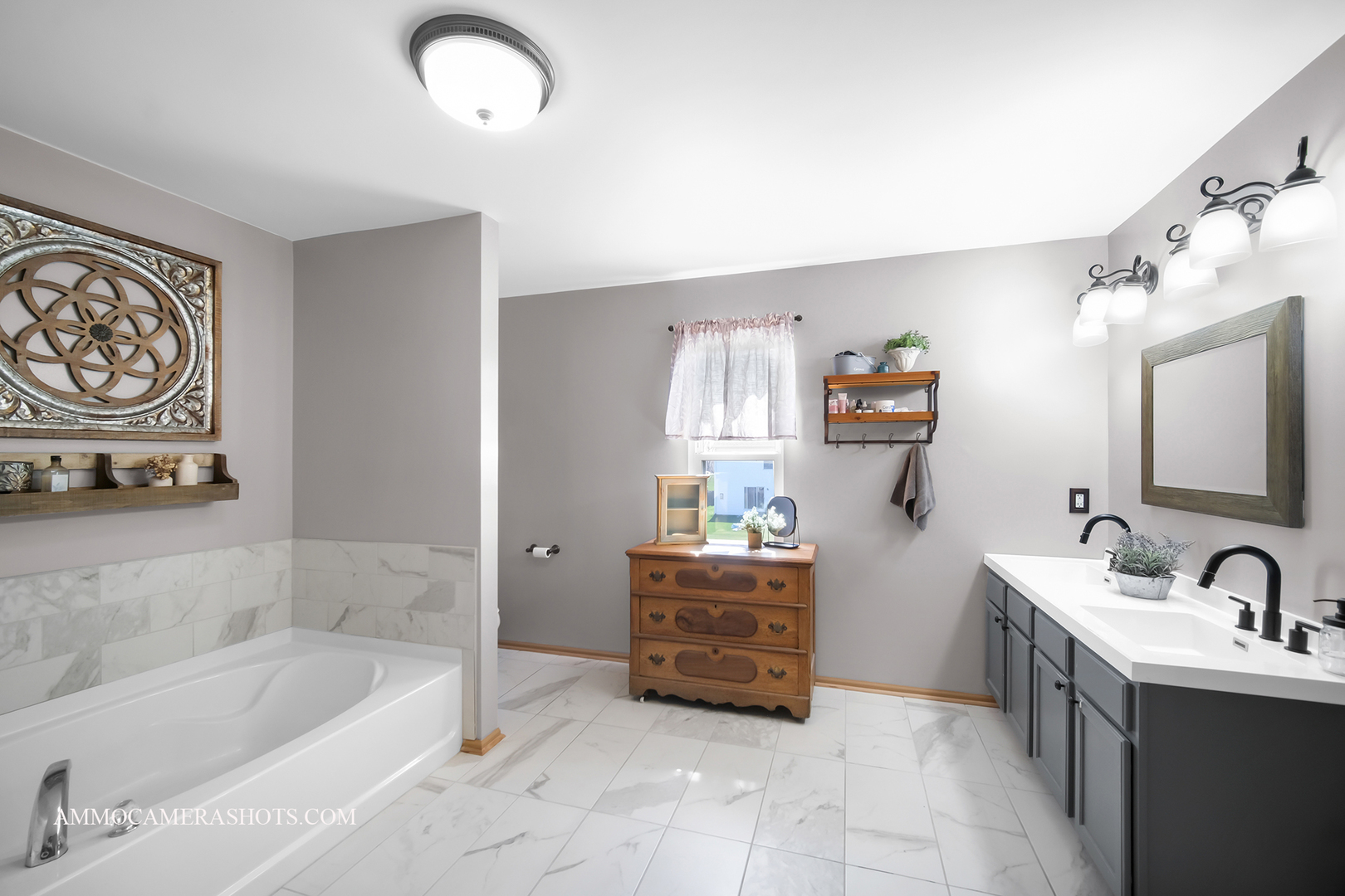 617 Kennedy Street Waterman, IL 60556 - Photo 16 of 32 a bathroom with a tub sink and mirror