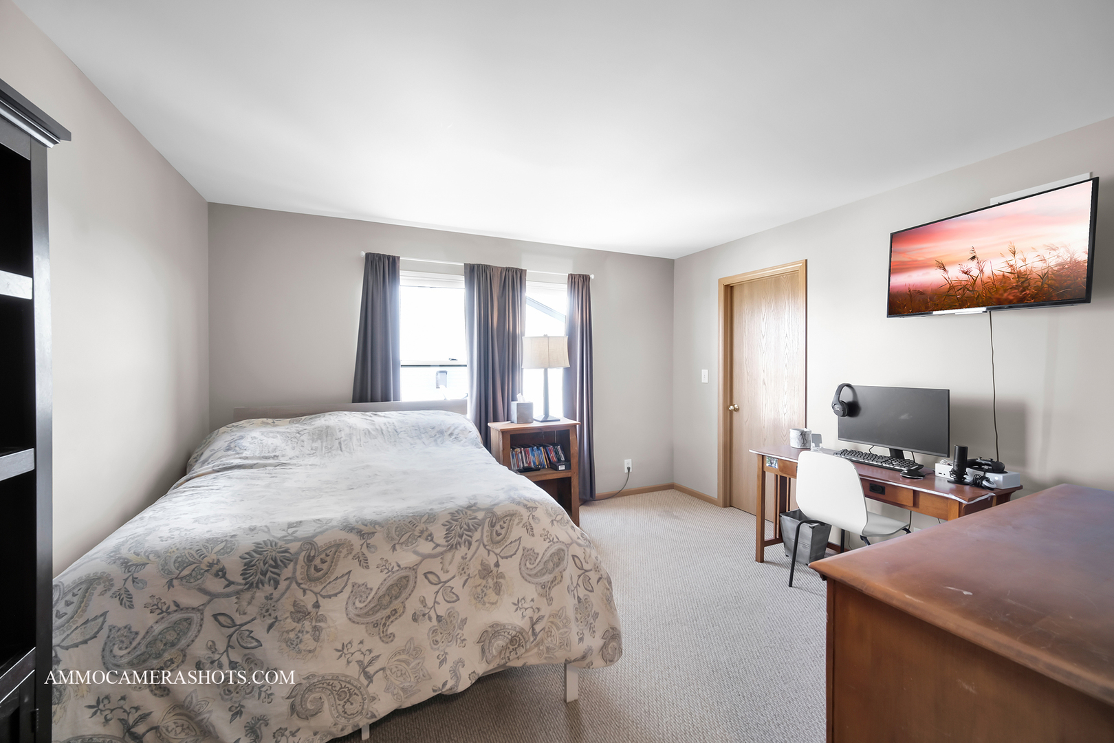617 Kennedy Street Waterman, IL 60556 - Photo 20 of 32 a bedroom with a bed and a flat screen tv