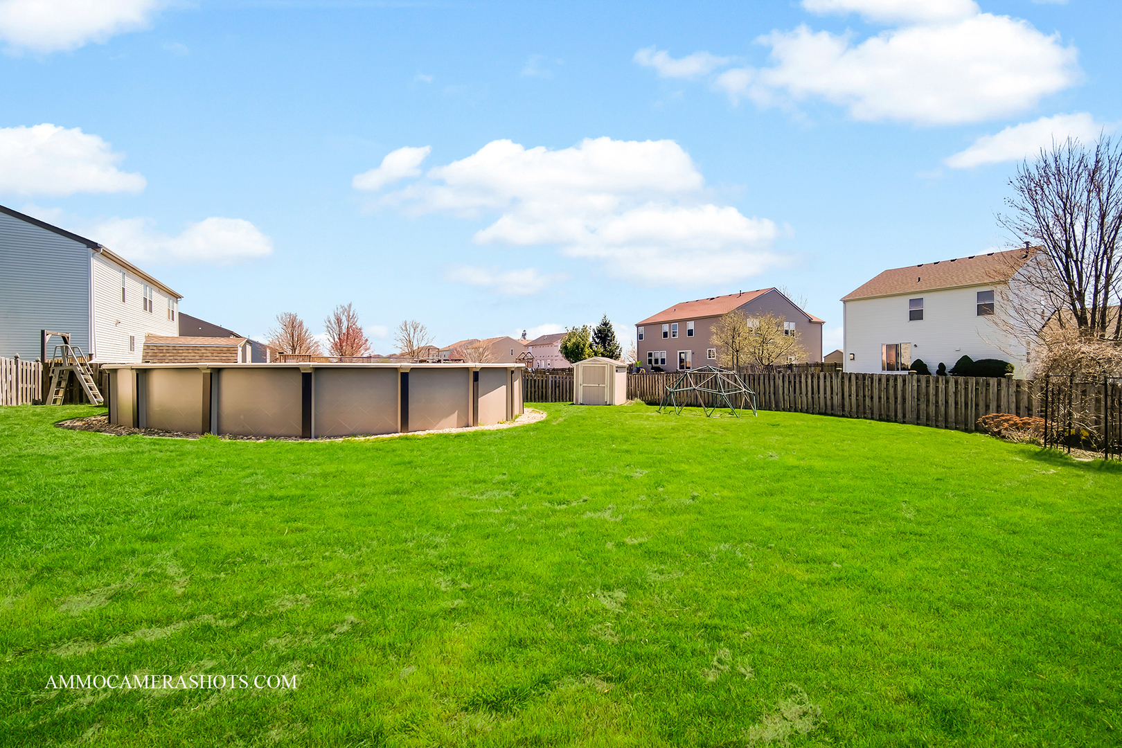 617 Kennedy Street Waterman, IL 60556 - Photo 24 of 32 a view of a house with a yard and sitting area