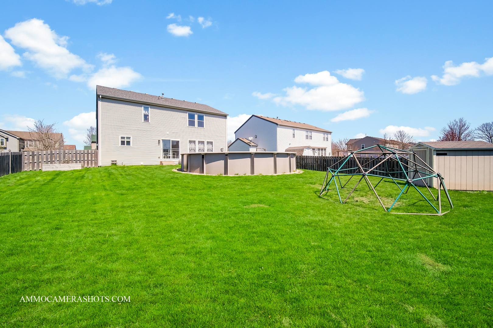 617 Kennedy Street Waterman, IL 60556 - Photo 26 of 32 a view of a house with a backyard