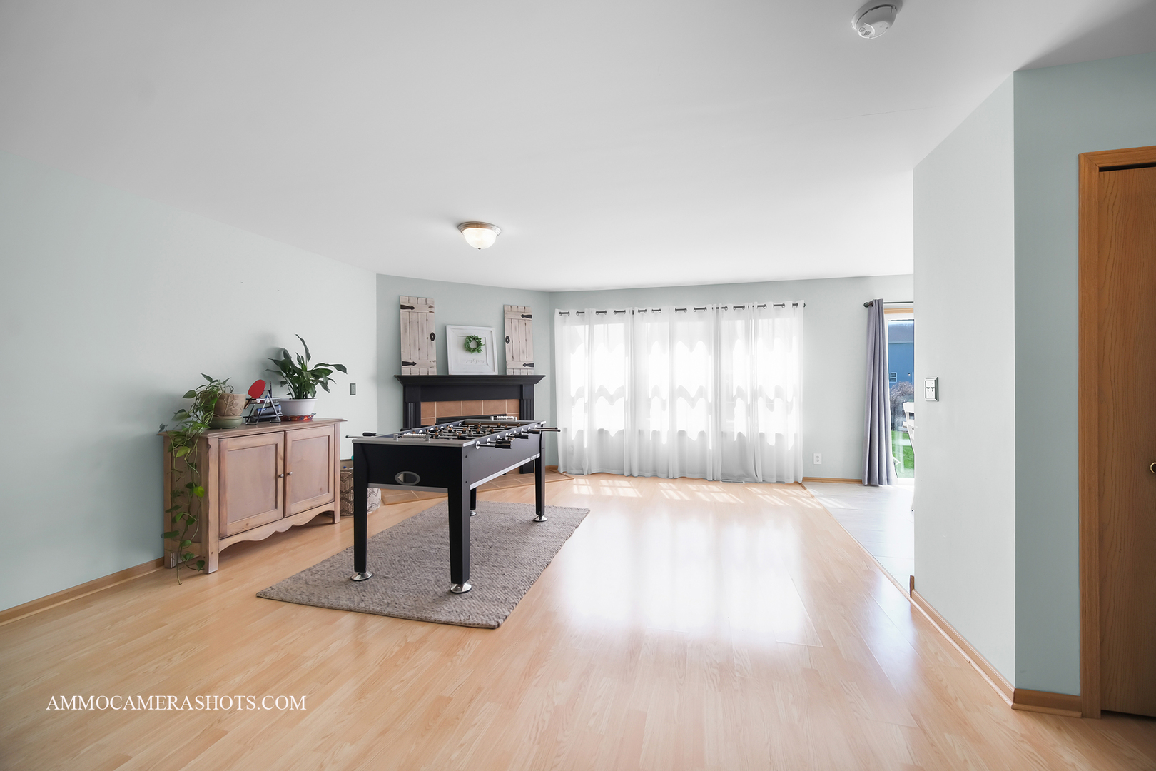 617 Kennedy Street Waterman, IL 60556 - Photo 6 of 32 a living room with furniture a window and a potted plant