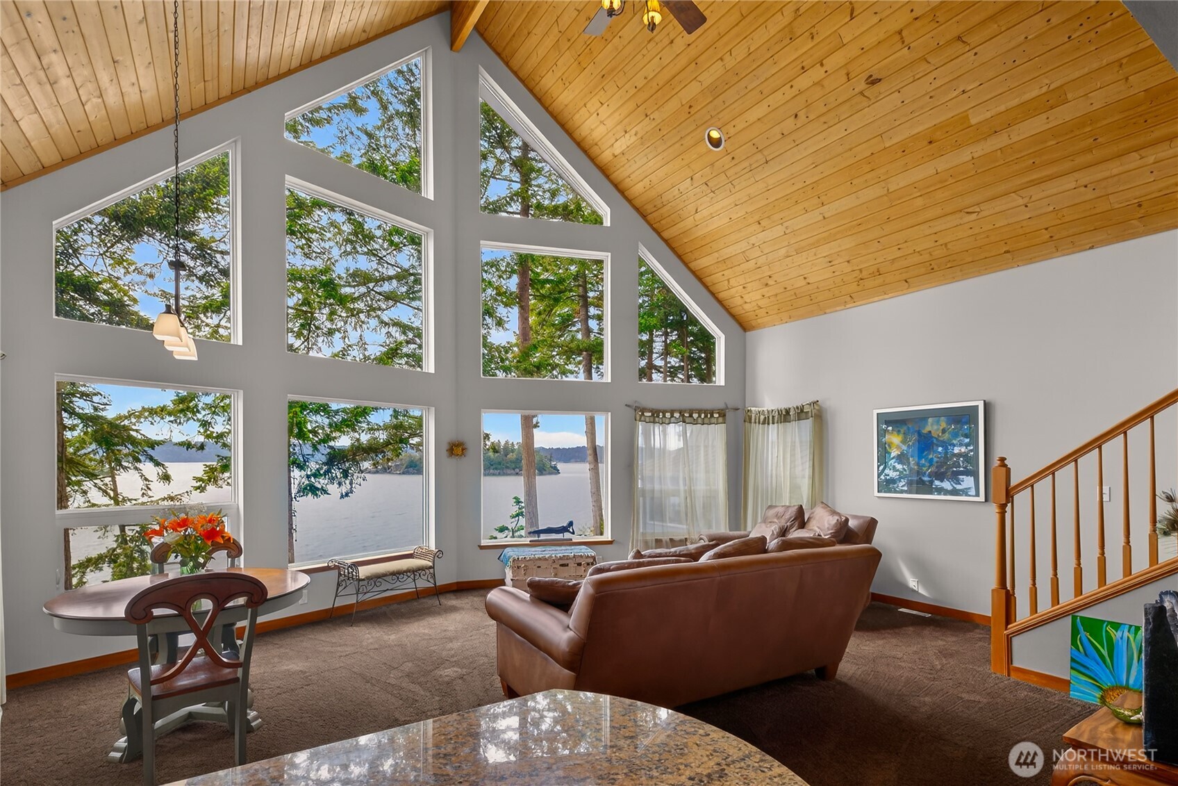 17946 Cobahud Road La Conner, WA 98257 - Photo 22 of 40 a living room with furniture and a large window