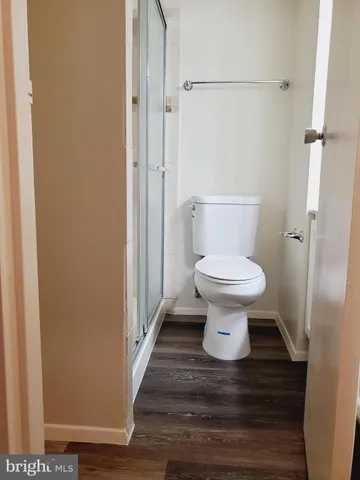 a bathroom with a toilet and a sink