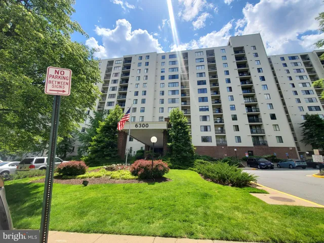 a front view of a building with garden