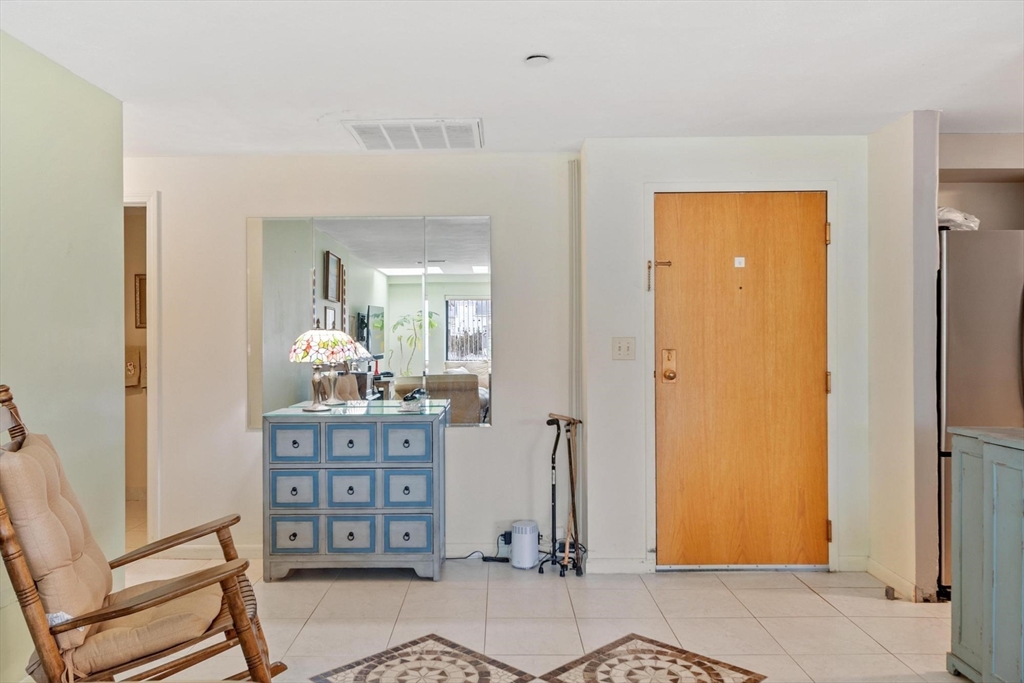 22 Railroad Street, Unit 504 Andover, MA 01810 - Photo 12 of 28 a view of walk in closet with wooden floor