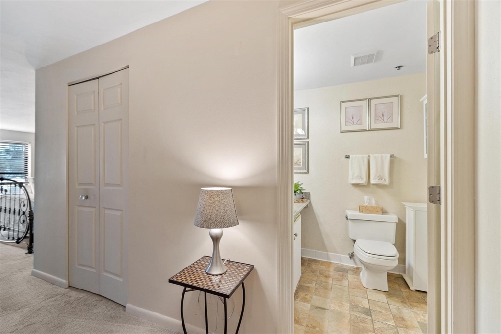 22 Railroad Street, Unit 504 Andover, MA 01810 - Photo 17 of 28 a bathroom with a toilet