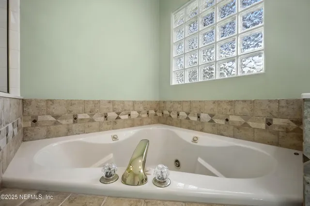 a bathroom with a bathtub