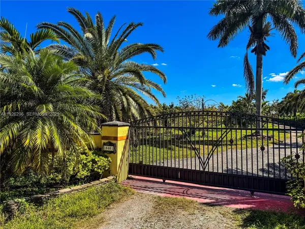 a view of a livingroom with furniture and wooden floor