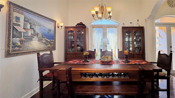 a room with pool table and flat screen tv