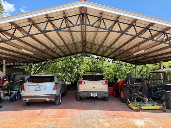 a view of yard with car parked