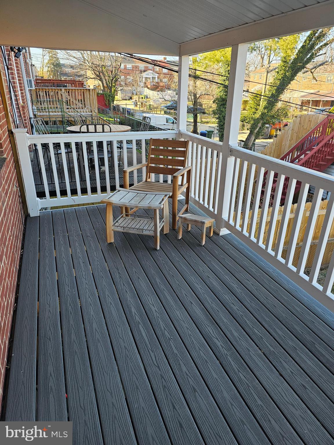 4728 Williston Street Baltimore, MD 21229 - Photo 11 of 17 a view of balcony with wooden floor