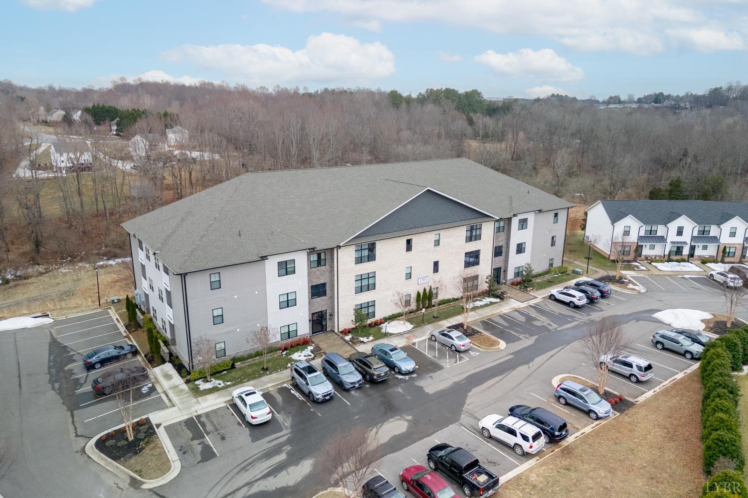 1301 Stoney Ridge Boulevard, Unit 208 Forest, VA 24551 - Photo 1 of 46 a view of multiple houses with a city