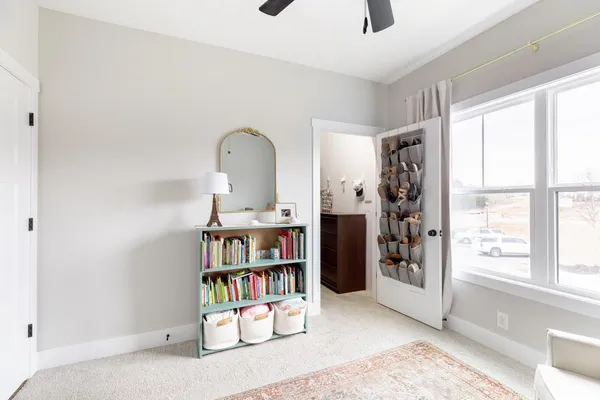 a view of a livingroom with shelves