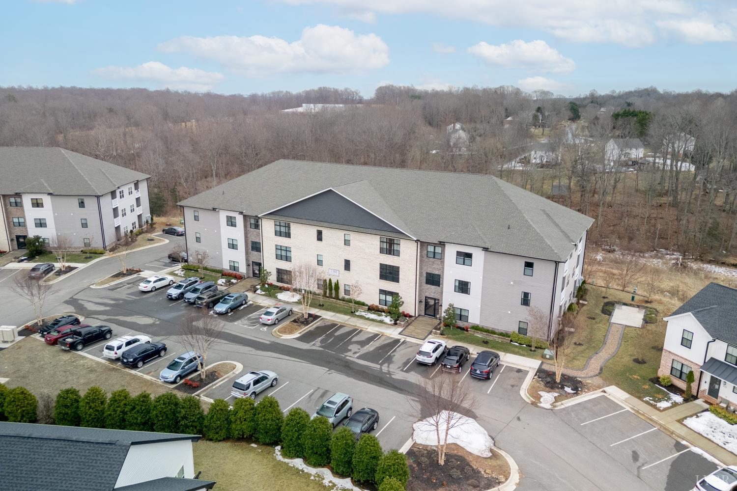 1301 Stoney Ridge Boulevard, Unit 208 Forest, VA 24551 - Photo 38 of 46 an aerial view of multiple houses with a city street