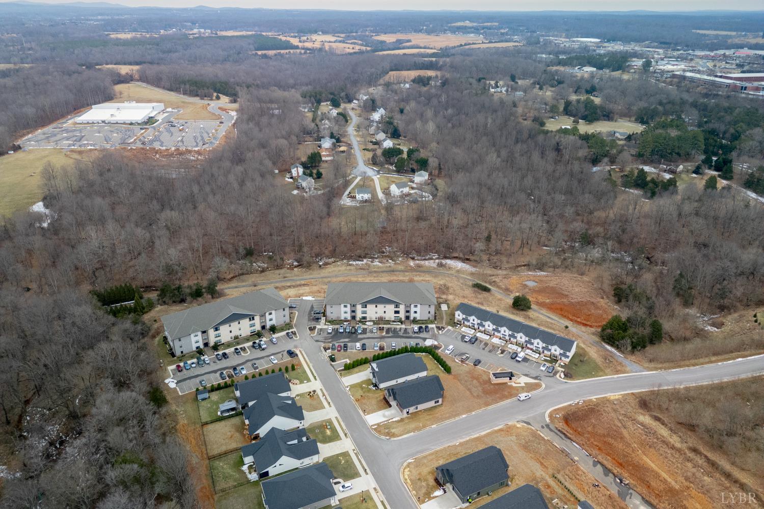 1301 Stoney Ridge Boulevard, Unit 208 Forest, VA 24551 - Photo 41 of 46 an aerial view of a house with a yard