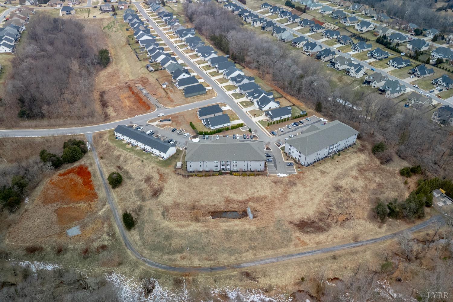 1301 Stoney Ridge Boulevard, Unit 208 Forest, VA 24551 - Photo 44 of 46 an aerial view of a house